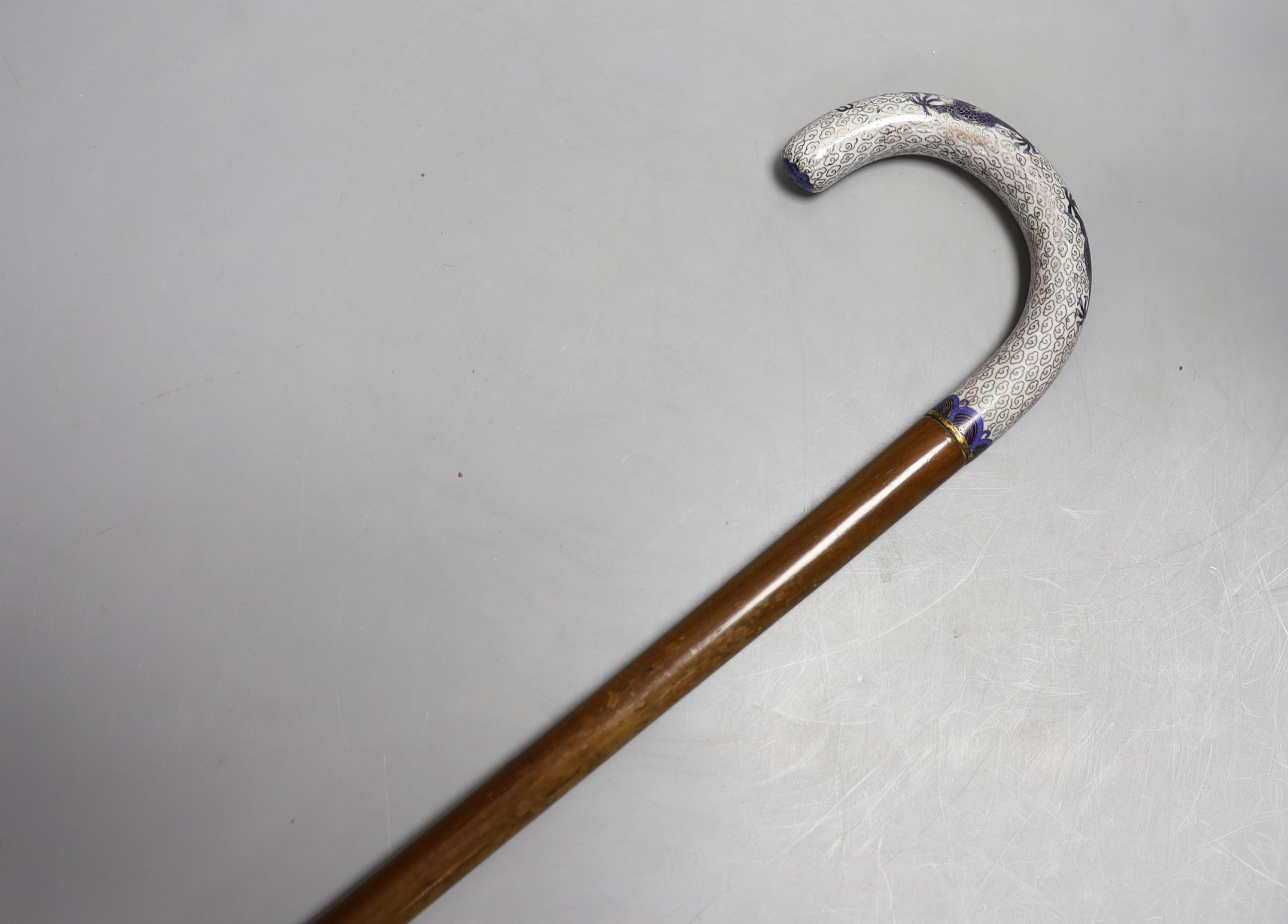 A 19th / 20th century Chinese walking stick with cloisonne handle with five claw dragon